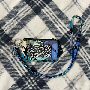 Gently used Vera Bradley coin purse with lanyard.